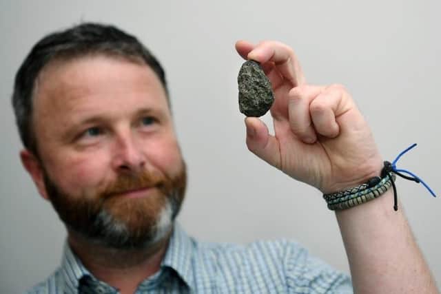 Dan Charlton was standing in his back garden in the early hours of the morning when he saw a green light and heard a “whoosh” as the object plummeted to earth. SWNS