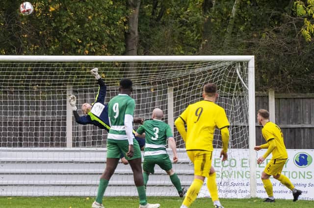 Glasshoughton Welfare goalkeeper Alfie Hayes-Daubney tips the ball over to help his team to a valuable point against Nostell MW. Picture: Scott Merrylees