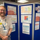 Dr David Aaron showcasing Navigating Suicide Prevention resources at the Trust Quality Conference.