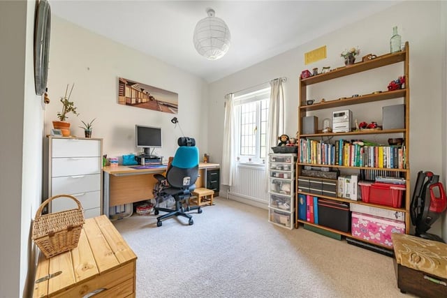 This home has two elegantly proportioned reception rooms that can be used as home offices.