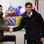 LULWORTH, UNITED KINGDOM - FEBRUARY 8: Prime Minister Rishi Sunak and Ukrainian President Volodymyr Zelensky meet Ukrainian troops being trained to command Challenger 2 tanks at a military facility on February 8, 2023 in Lulworth, Dorset, England. The Ukrainian President makes a surprise visit to the UK today in his second visit outside Ukraine since the Russian invasion nearly a year ago. The UK will offer further support in the form of training, equipment, and Russian sanctions. (Photo by Andrew Matthews/WPA Pool/Getty Images)