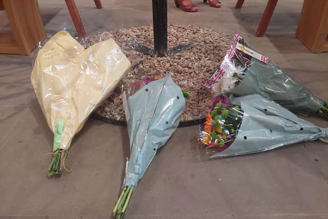 People laid flowers at the display inside Wakefield Cathedral to show their respect.