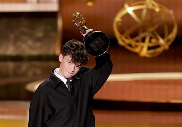 Owen Cooper accepts the Outstanding Supporting Actor in a Limited or Anthology Series or Movie award for 'Adolescence' onstage during the 77th Primetime Emmy Awards.