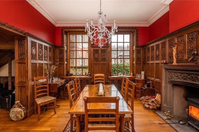 The dining hall is another impressive room, with its large fireplace and detailed wood carving.