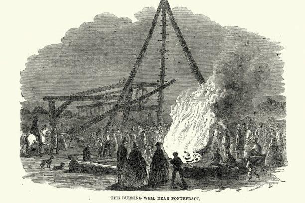 Vintage illustration of The Burning Well near the Featherstone Station in the vicinity of Pontefract, 1861, 19th Century.  It is believed to be caused by workers boring for coal.