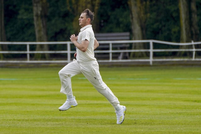 Opening bowler Matthew Rees on his run up to the wicket.