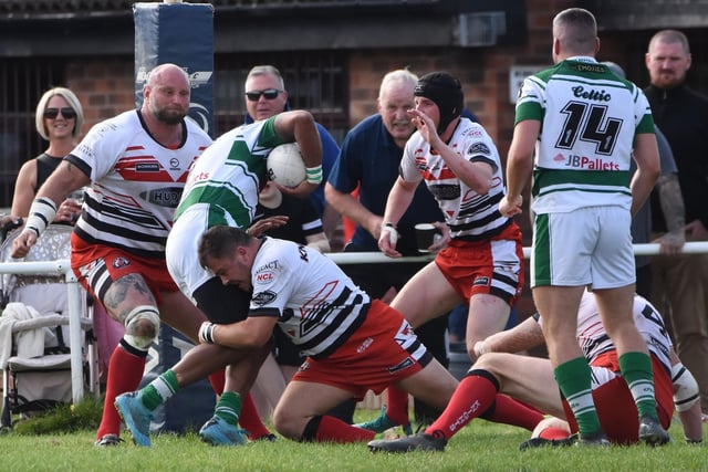 Normanton Knights come under pressure on their line.