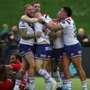 Wakefield Trinity's Josh Griffin celebrates with teammates after scoring a try at Sheffield. Picture by John Clifton/SWpix.com