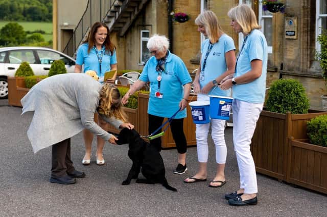 Guide Dogs volunteers at an event