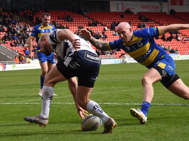Brad Day touches down for one of his two tries for Featherstone Rovers at Doncaster. Picture: Rob Hare