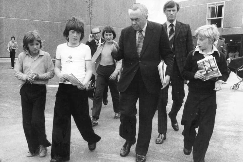 Young autograph hunters catch Sir Harold Wilson as he leaves Featherstone High School, 1976.