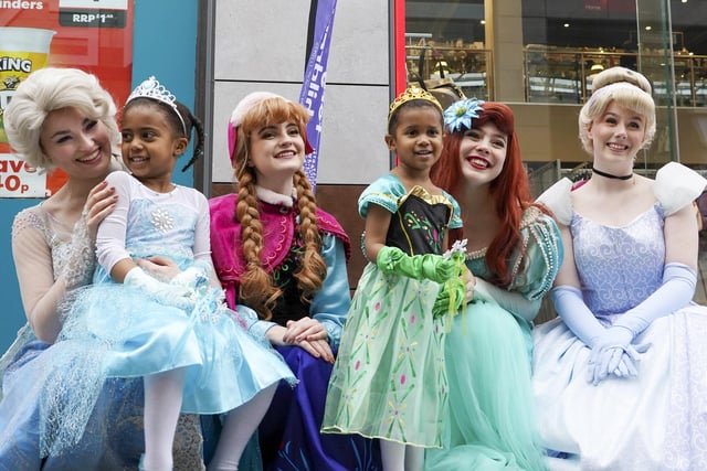The Disney Princesses also proved popular - with queues of shoppers hoping to get a snap with their favourite princess.
