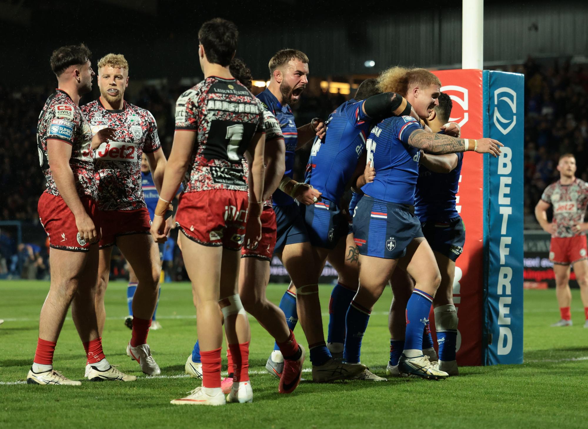 12-man Wakefield Trinity storm into play-off semi-finals for first time ...