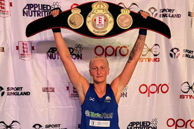 Farrah Cunniff with her national title belt.