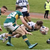 Featherstone Rovers skipper Ben Reynolds forces his way over for a try in the opening AB Sundecks 1895 Cup tie at Hunslet. Picture: Kevin Creighton
