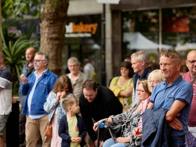 The crowd enjoys a performance during the Bank Holiday celebrations