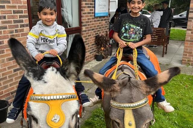 Kids got to enjoy  donkey rides at the care home's garden party celebration