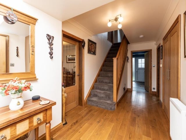 The entrance hallway with cloaks supboard and w.c. leads in to the house.