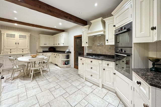 The open plan breakfast kitchen is bright and spacious.