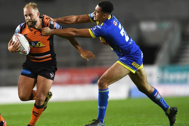 Luis Johnson in action against Castleford Tigers as he comes up against his new skipper, Paul McShane.