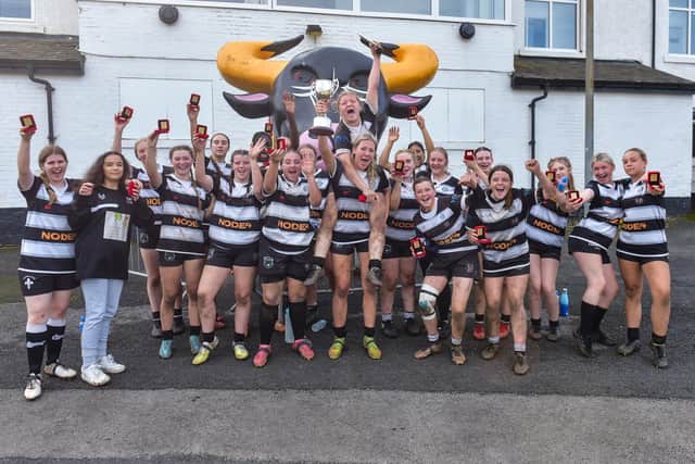Bronte Barbarians U15s Girls celebrate and show off the trophy and medals won after their National Cup final victory. Photo by Craig Cresswell