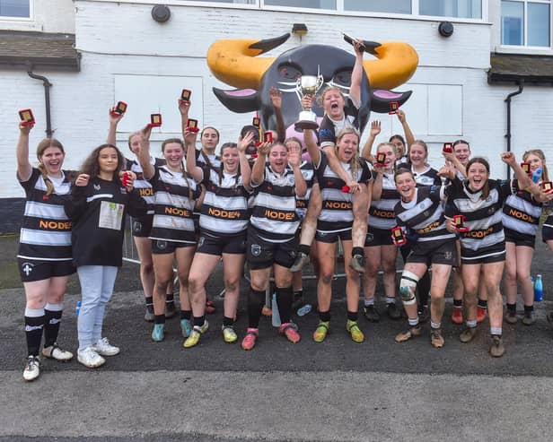 Bronte Barbarians U15s Girls celebrate and show off the trophy and medals won after their National Cup final victory. Photo by Craig Cresswell