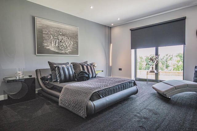 A king-size bedroom with outdoor access. All six bedrooms have en suite facilities.