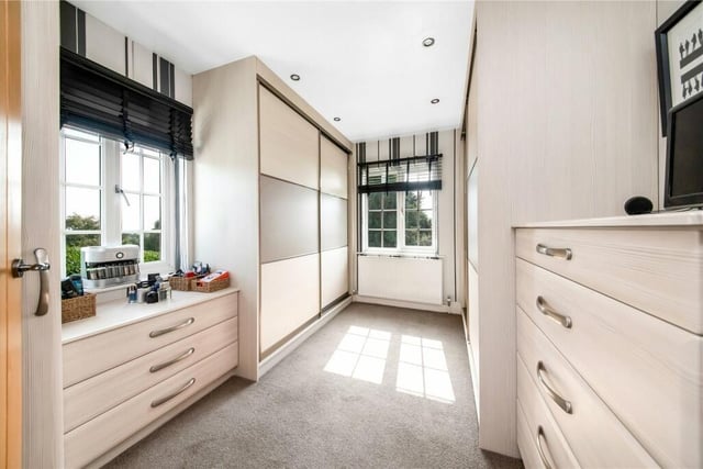 There are four further double bedrooms, one of which is currently used as a dressing room and a contemporary house bathroom with bath and separate walk-in shower unit.