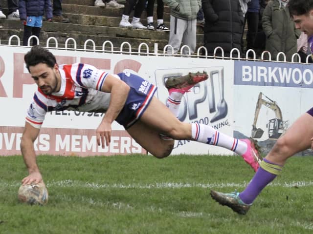 Romain Franco comes up with a spectacular dive to score one of Wakefield Trinity's 19 tries against Newcastle Thunder in the 1895 Cup. Picture: Kevin Creighton