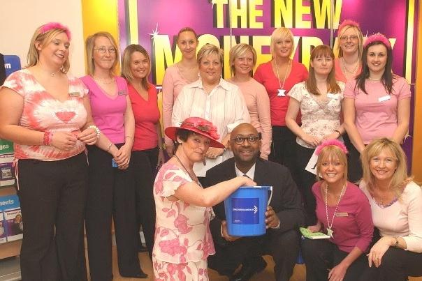 Halifax bank Westgate Wakefield branch. Howard from the TV commercial called in and helped with the cancer research uk raffle being run by branch manager Wendy Grinsill [right front] and her staff.