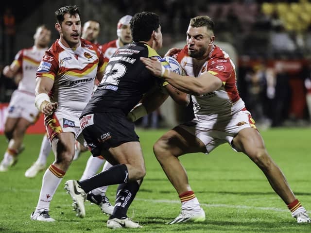 Charbel Tasipale comes up against former Castleford Tigers forward Mike McMeeken in the Super League game against Catalans Dragons. Picture by Rémi Vignaud/Catalans Dragons/SWpix.com