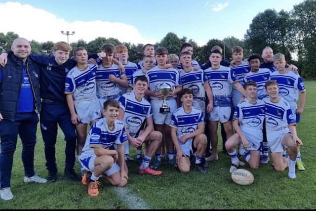 Lock Lane's successful under 13s side celebrated becoming Yorkshire League champions.
