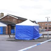 Police taped off part of the car park in Wakefield and put up a forensics tent