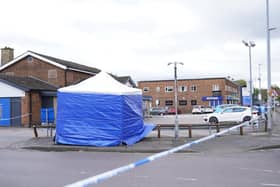 Police taped off part of the car park in Wakefield and put up a forensics tent