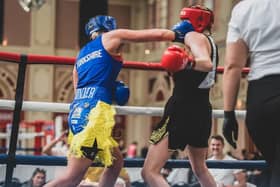Farrah Cunniff lands a punch on her opponent in the Haringey Box Cup.