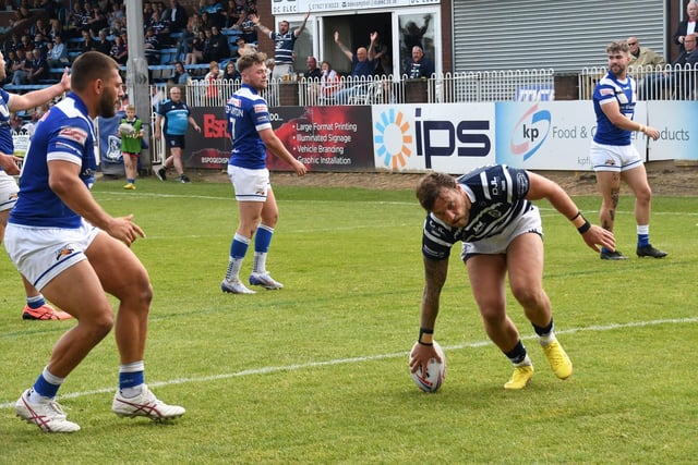 Chris Hankinson touches down for a try.