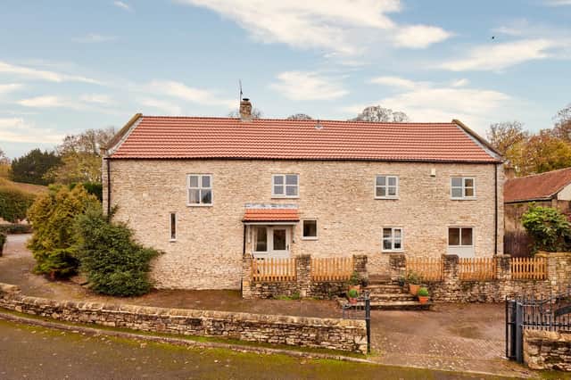 This characterful barn conversion in the village of Womersley has lovely south-facing gardens.