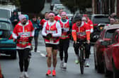 Kevin Sinfield and the team approach the finish line in Saddleworth.