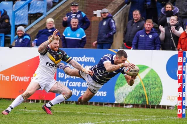 Gareth Gale produces a spectacular dive to score a try for Featherstone Rovers against York Knights.