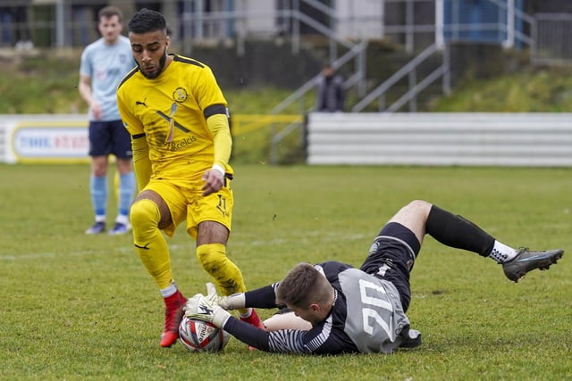 Nostell MW's Tawheed Ahmed is denied by Beverley Town goalkeeper Ben Voase.