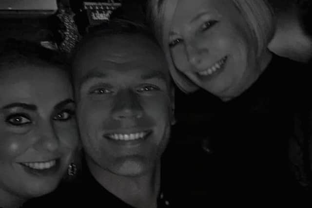 Danny with his sister and mum