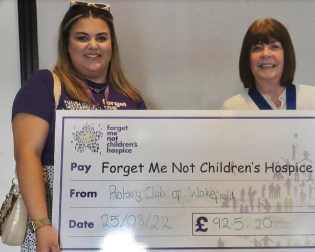 Alex Chanteleau (left) receives the cheque from Carol Green, President of the Rotary Club of Wakefield.