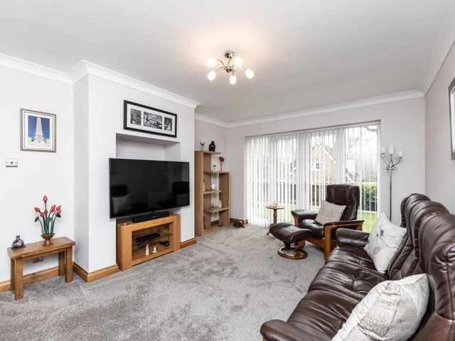 The living room has patio doors out to the garden.