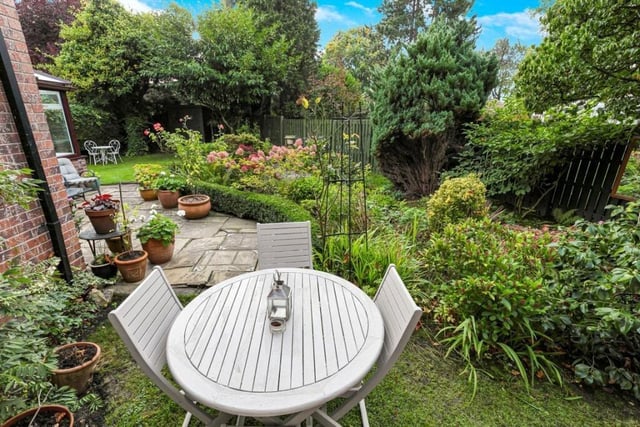 The colourful and well-stocked garden, with patio seating, also has privacy.