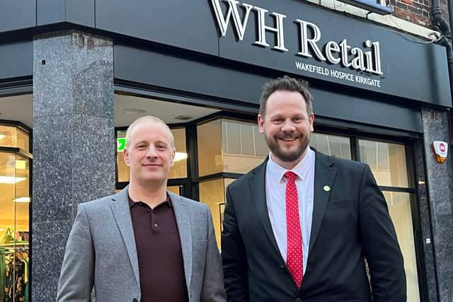 Wakefield MP Simon Lightwood, right, unveiled the new charity shop. He is pictured with Matt Berry, hospice area retail manager.