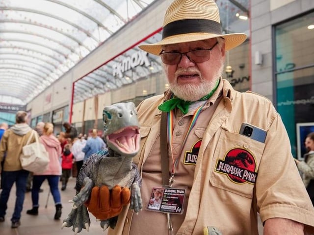 Dinosaurs from Jurassic World - including a very naughty one hidden in his bag!