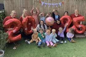 Team members and children at Partou Woodlands House celebrating their success