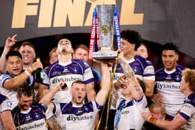 Max Jowitt lifts the Super League trophy after his memorable last game for Wakefield Trinity. Photo by John Clifton
