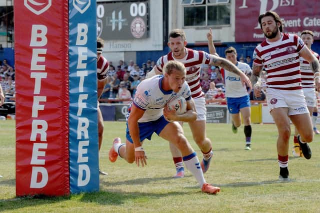 Jacob Miller in try scoring action for Wakefield Trinity in 2022.