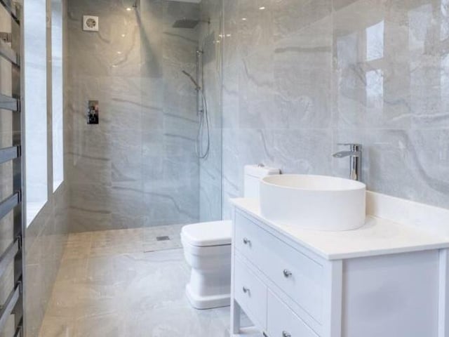 Additional property features include a wine cellar and a detached garage.